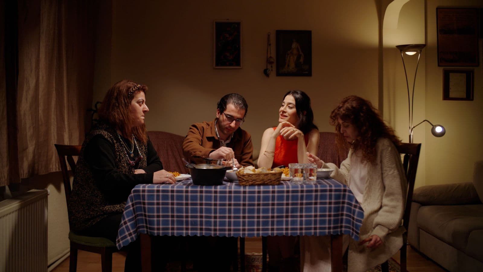 A family sharing an unhurried dinner together at home.